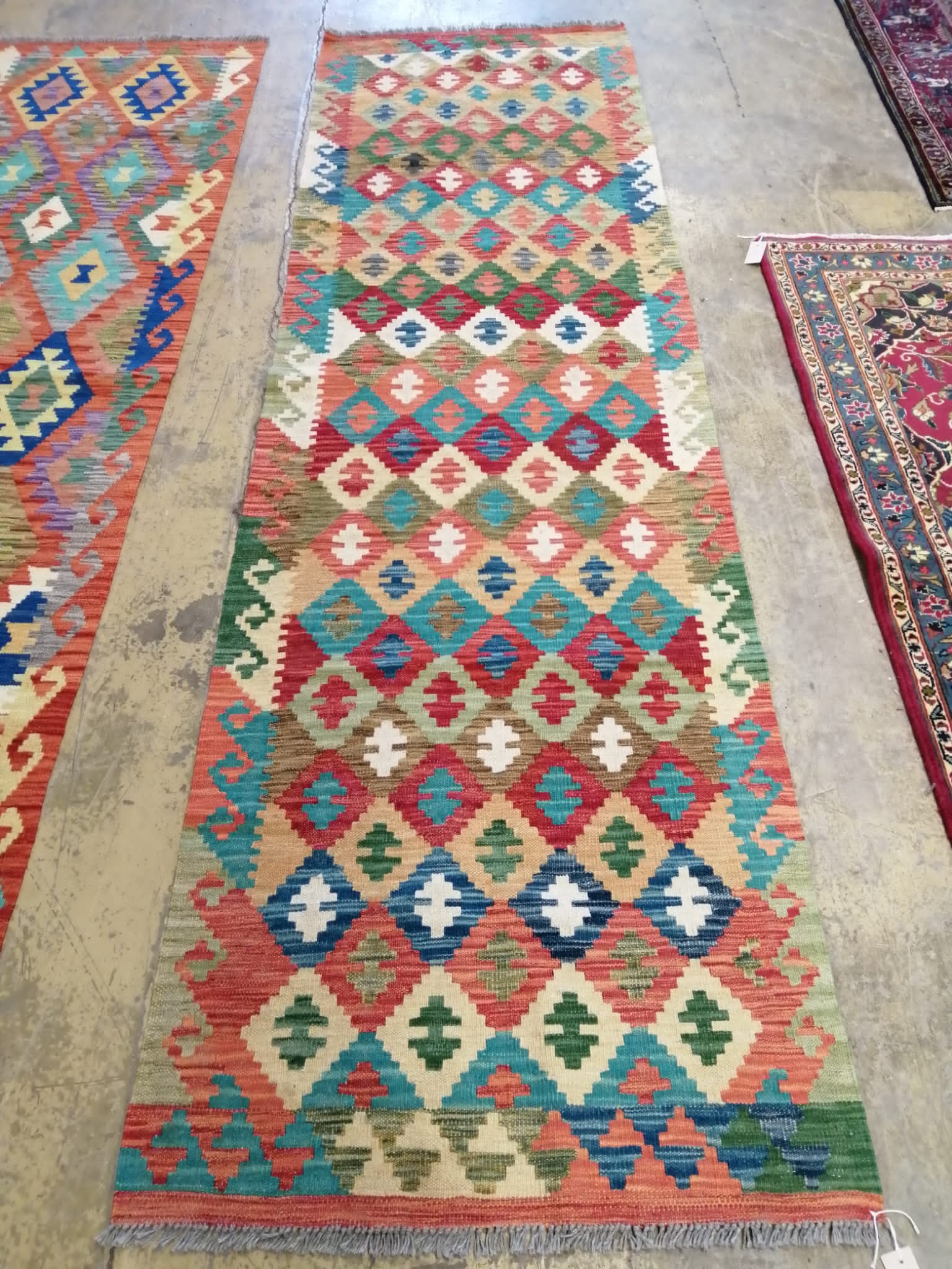 A Kilim multicoloured runner, 295cm x 87cm